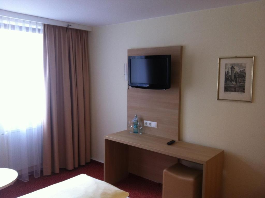Tauberhotel Kette Вертгайм Номер фото